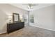 Spacious bedroom with carpeted floor, ceiling fan, and ample closet space at 372 Hinsdale Dr, Debary, FL 32713