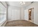 Bedroom with double door closet and access to bathroom at 372 Hinsdale Dr, Debary, FL 32713
