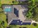 Home with solar panels and a pool, seen from above at 372 Hinsdale Dr, Debary, FL 32713