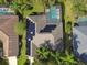 Bird's-eye view of a home with solar panels and pool at 372 Hinsdale Dr, Debary, FL 32713