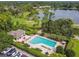 Resort-style pool with a clubhouse and plenty of lounge chairs at 372 Hinsdale Dr, Debary, FL 32713
