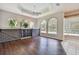 Gathering room features hardwood floors and three arched windows at 372 Hinsdale Dr, Debary, FL 32713