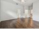 Spacious bedroom with hardwood floors and access to bathroom and closets at 372 Hinsdale Dr, Debary, FL 32713