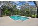 Enjoy this screened-in pool with a relaxing view at 372 Hinsdale Dr, Debary, FL 32713