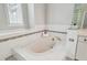 Relaxing bathroom with a built-in soaking tub and decorative tile accents at 372 Hinsdale Dr, Debary, FL 32713