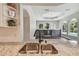 Spacious kitchen featuring granite countertops, stainless steel appliances, and a view of the pool at 372 Hinsdale Dr, Debary, FL 32713