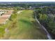 Aerial view of golf course with houses nearby at 372 Hinsdale Dr, Debary, FL 32713