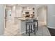 Kitchen boasts stainless steel appliances and white cabinets at 372 Hinsdale Dr, Debary, FL 32713
