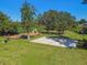 Community playground with swings, slides, and basketball court nearby at 372 Hinsdale Dr, Debary, FL 32713