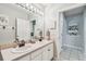 Double vanity bathroom with updated fixtures and flooring at 372 Hinsdale Dr, Debary, FL 32713