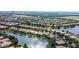 Aerial showcasing lakefront homes and landscape at 11826 Aurelio Ln, Orlando, FL 32827