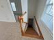 Wooden staircase leading to the lower level at 7465 Excitement Dr, Reunion, FL 34747