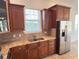 Kitchen features granite countertops and modern cabinetry at 7465 Excitement Dr, Reunion, FL 34747