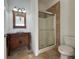 Bathroom with vanity, toilet, and shower at 7465 Excitement Dr, Reunion, FL 34747