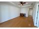 Spacious living room with hardwood floors and wet bar at 7465 Excitement Dr, Reunion, FL 34747