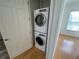 Stackable washer and dryer in a closet at 7465 Excitement Dr, Reunion, FL 34747