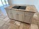 Large kitchen island with granite countertop and storage at 7465 Excitement Dr, Reunion, FL 34747