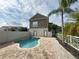Private pool and spa with brick pavers, and fenced backyard at 7465 Excitement Dr, Reunion, FL 34747