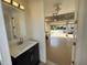Attached garage with additional sink and mirror at 7465 Excitement Dr, Reunion, FL 34747