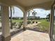 Covered patio overlooking golf course at 7465 Excitement Dr, Reunion, FL 34747