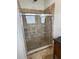 Large walk-in shower with tile surround at 7465 Excitement Dr, Reunion, FL 34747