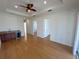 Spacious bonus room featuring hardwood floors and a wet bar at 7465 Excitement Dr, Reunion, FL 34747