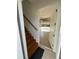Elegant wooden staircase leading to the upper level at 7465 Excitement Dr, Reunion, FL 34747