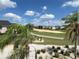Community view of homes and golf course at 7465 Excitement Dr, Reunion, FL 34747