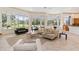 Spacious living room with ample natural light and comfortable seating at 256 New Gate Loop, Lake Mary, FL 32746