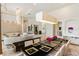 Elegant dining room features a large table and chandelier at 256 New Gate Loop, Lake Mary, FL 32746
