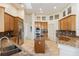 Spacious kitchen with granite counters and stainless steel appliances at 256 New Gate Loop, Lake Mary, FL 32746
