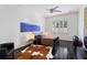 Comfortable bedroom with hardwood floors, large window, and a stylish rug at 256 New Gate Loop, Lake Mary, FL 32746