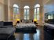 Bedroom with a king-size bed and dark wood floors at 256 New Gate Loop, Lake Mary, FL 32746