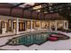 Spacious pool and spa with screened enclosure and patio furniture at 256 New Gate Loop, Lake Mary, FL 32746