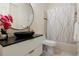 Spa-like bathroom with a black vessel sink, large mirror and updated shower at 256 New Gate Loop, Lake Mary, FL 32746