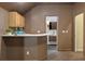 Basement wet bar with a countertop and cabinetry for storage at 256 New Gate Loop, Lake Mary, FL 32746