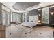 Main bedroom with king-size bed and large windows at 256 New Gate Loop, Lake Mary, FL 32746