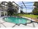 Inviting screened pool with spa and tranquil backyard views at 256 New Gate Loop, Lake Mary, FL 32746