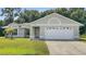 One-story home with attached garage at 1021 Embrun Ct, Kissimmee, FL 34759