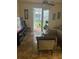 Living room with tiled floors and patio access at 3000 Laurel Park Ln # 104, Kissimmee, FL 34741