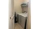 Laundry room with washer, dryer, and shelving at 3000 Laurel Park Ln # 104, Kissimmee, FL 34741
