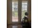 View of patio through double doors at 3000 Laurel Park Ln # 104, Kissimmee, FL 34741