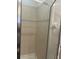 Shower stall with tiled walls and glass door at 3000 Laurel Park Ln # 104, Kissimmee, FL 34741