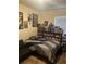Bedroom with a bed and lots of collectibles at 3000 Laurel Park Ln # 104, Kissimmee, FL 34741