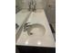 Double vanity bathroom sinks with granite countertops at 3000 Laurel Park Ln # 104, Kissimmee, FL 34741