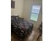 Bedroom with tile flooring and a bed at 3000 Laurel Park Ln # 104, Kissimmee, FL 34741