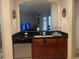 Kitchen boasts granite countertops, a double sink, and a dishwasher at 3000 Laurel Park Ln # 104, Kissimmee, FL 34741