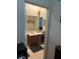 Clean bathroom with a single vanity and shower access at 3000 Laurel Park Ln # 104, Kissimmee, FL 34741