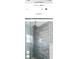 Modern shower with glass enclosure and grey tile at 2228 Sylvan Ct, Kissimmee, FL 34746