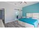 Spacious main bedroom with ensuite bathroom and barn door at 2228 Sylvan Ct, Kissimmee, FL 34746